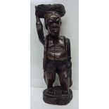 A carved African figure,
