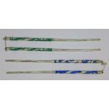 Two pairs of silver and enamel chopsticks,