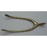 A pair of novelty silver wishbone shaped sugar nips