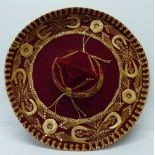 A Calidad Mariachi red sombrero