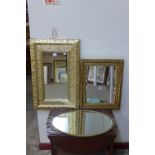 Three gilt framed mirrors