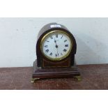 An Edward VII inlaid mahogany mantel clock