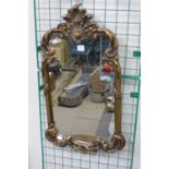 A Rococo style gilt framed mirror