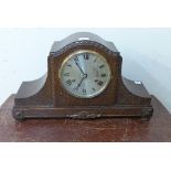 An oak mantel clock