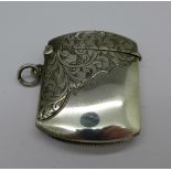 A silver vesta case