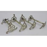 Four early Victorian silver knife rests, 91.
