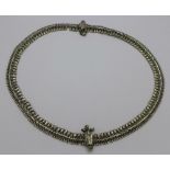 An Eastern white metal fringe necklet,