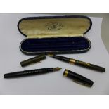 Two Watermans pens, a One Hundred Year pen with 14k gold nib,