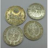 A 1972 German 10 mark Olympic coin and three 1930's funf mark coins