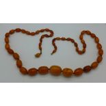 A set of butterscotch amber beads,