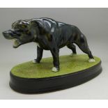 A Beswick Staffordshire bull terrier on base,