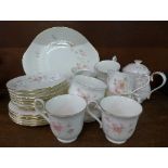A Royal Albert Breath of Spring tea service comprising a serving plate, six side plates,