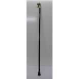 A walking cane with 925 silver covered lion's head top