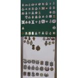 A large collection of military badges comprising fifty-nine TA Regiments badges and thirty-six