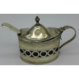 A George III silver mustard pot with blue glass liner, London 1797,