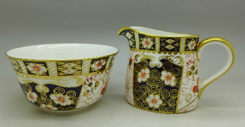 A Royal Crown Derby 2451 pattern sugar bowl and cream jug