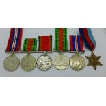 Three WWII medals including an Africa Service Medal to 98217 H.E.