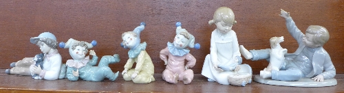 Six Nao figures including three child clown figures