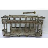 A built Meccano tram,