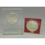 Two silver proof coins,
