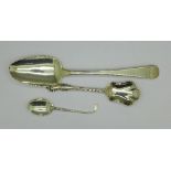 A Georgian silver tablespoon, a silver sugar/jam spoon and a silver golf club shaped spoon,