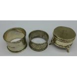 Two silver napkin rings and a silver ring box with initial, 71.
