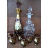 A Bohemian glass liqueur set and one other glass decanter