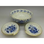 A Charlotte Rhead Bursley ware bowl, TL40 pattern and two similar dishes, diameter of bowl 14.