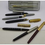 Six pens, three with 14k nibs; Parker,