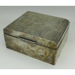 A silver cigarette box, Walker & Hall, width 11.