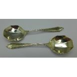 A pair of silver spoons,