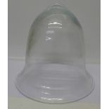 A bell shaped glass dome, height 29cm,