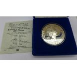 A Turks and Caicos 100 crowns coin, limited edition of 15,000, 5oz of pure silver,