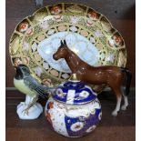 An Imari pattern scallop edge tray, a model of a horse,