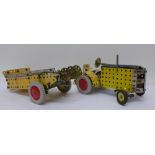 A built clockwork Meccano tractor and trailer,