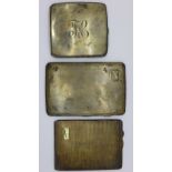 Three silver cigarette cases, with inscriptions,