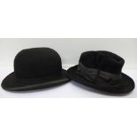 A bowler hat and one other hat