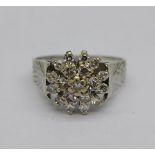 An 18ct white gold and diamond cluster ring, 5g,