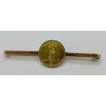 A 9ct gold golf brooch with inscription dated 1929, 6.