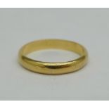 A yellow metal wedding band, 2.