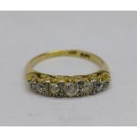 An 18ct gold and five stone diamond ring, 0.75 carat total diamond weight, 3.