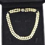 A pearl two-strand necklace with 18ct white gold clasp