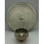 A white metal bowl and platter