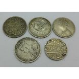 Four silver Indian Rupees and one other silver coin