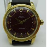 A gold capped Omega Seamaster bumper automatic wristwatch, maroon dial, leather strap,