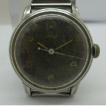 A nickel and stainless steel Omega manual wind wristwatch, black dial, 15 jewels, not working.