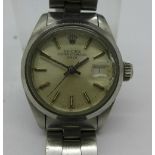 A lady's stainless steel Rolex Oyster Perpetual wristwatch, calendar dial, Rolex bracelet strap,