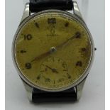 An Omega manual wind wristwatch, 265 calibre, 15 jewels, lacking crown, ticking.