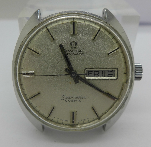 A stainless steel Omega Cosmic wristwatch, day/date, crown and stem a/f, not working.