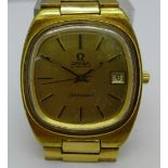 A gold plated Omega Seamaster automatic wristwatch, Omega strap, 35mm diameter,